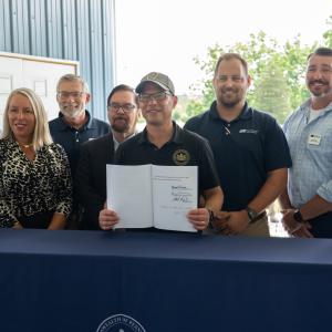 Mitchell Kurek with Pennsylvania Gov. Josh Shapiro at the signing ceremony for two landmark bills benefiting the state's farming community.